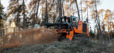 FAE PT550 Tracked Carrier grinding up tree in woods