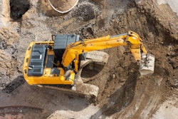 excavator digging dirt