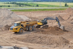 Excavator loading a haul truck