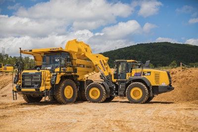 Komatsu WA475 wheel loader with truck