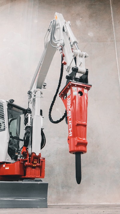 Takeuchi hydraulic hammer on excavator studio shot