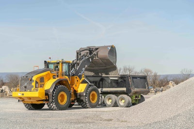 Volvo L180H wheel loader with truck