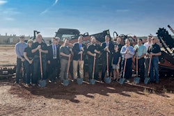 guests lined up to officially break ground on the expansion