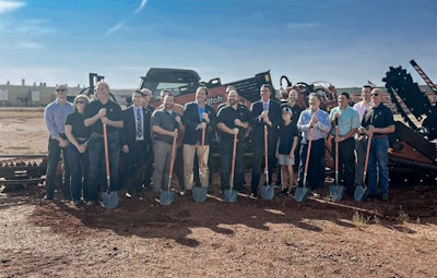 guests lined up to officially break ground on the expansion