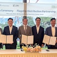 NED and hyundai CE executives sign distribution agreement under banner