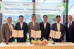 NED and hyundai CE executives sign distribution agreement under banner