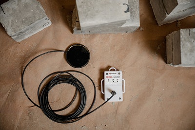 A rebele sensor and its handheld device on the floor