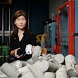 inventor luna lu holds a rebele sensor in a lab
