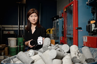 inventor luna lu holds a rebele sensor in a lab