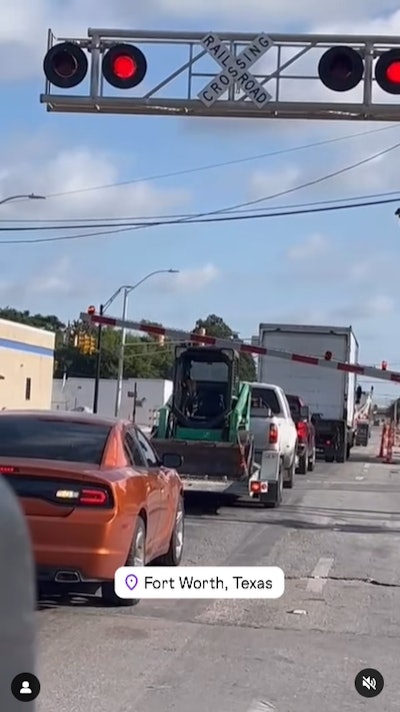Trinity Express train hits trailer hauling a skid steer parked on the tracks in Fort Worth, Texas