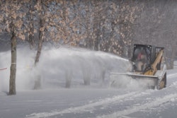 Blue Diamond Snow Blower on Cat CTL blowing snow
