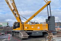 mobile crawler crane L&I photo shows the crane used to hoist workers and materials up and down a 95-foot shaft