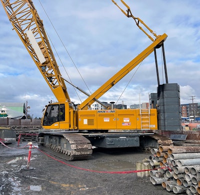 mobile crawler crane L&I photo shows the crane used to hoist workers and materials up and down a 95-foot shaft