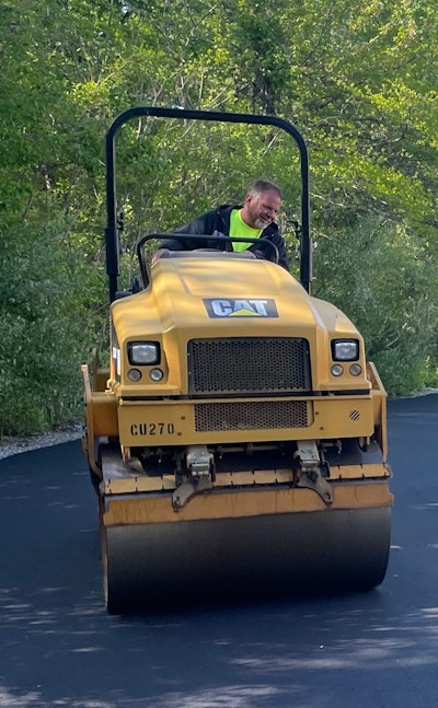 william d'amico operating cat asphalt roller
