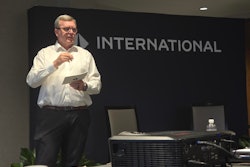 Dan Kayser, International, speaking on stage
