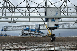 Tybot tying rebar on bridge deck under construction