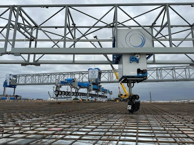 Tybot tying rebar on bridge deck under construction