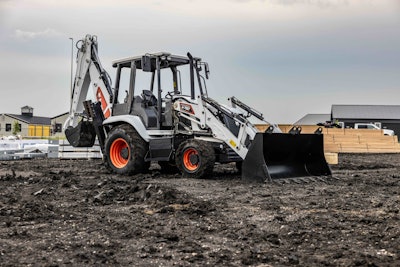 bobcat b760 backhoe side view stationary on dirt jobsite