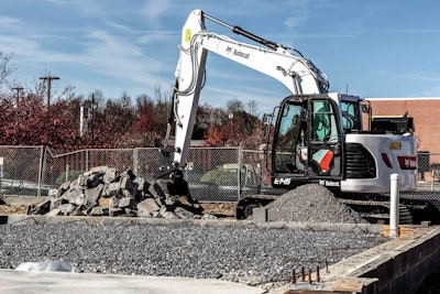 bobcat e145 excavator by rubble piles