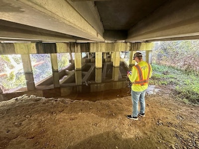 FDOT employee assesses a bridge