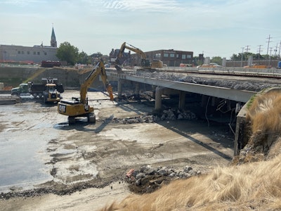 excavators work on the Columbus Downtown Ramp Up I-70/71