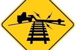 yellow warning sign low ground clearance railroad crossing