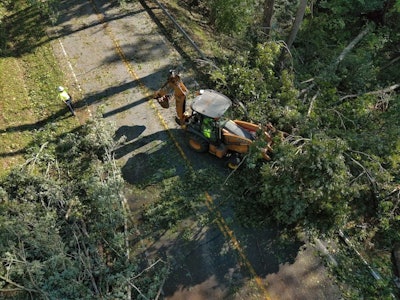 SCDOT crew works to clear trees off a road
