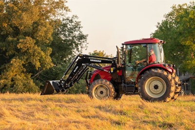 Yanmar SM475 compact utility tractor with bucket attachment