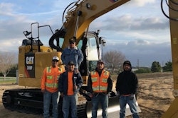 Buenas Brothers Construction owners next to a Cat excavator