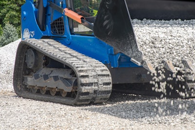 Blue Diamond rubber tracks on blue compact track loader