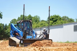 Blue diamond land grader attachment on compact track loader pushing dirt