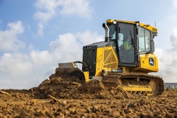 John Deere 550 P-Tier dozer pushing dirt