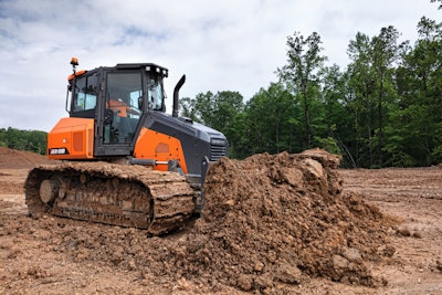 Develon DD130 dozer pushing dirt