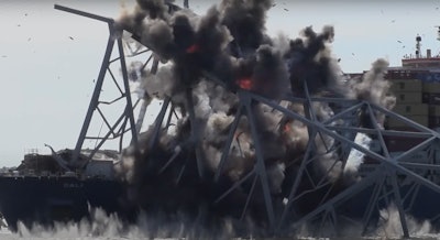 controlled demolition of debris that landed on a cargo ship that crashed into the Key Bridge in Baltimore