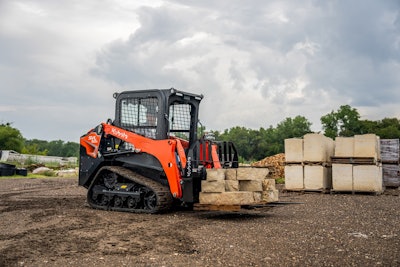 Kubota SVL50x CTL carrying stone on pallet forks