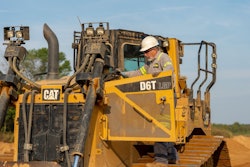 opeartor enters a caterpillar D6T