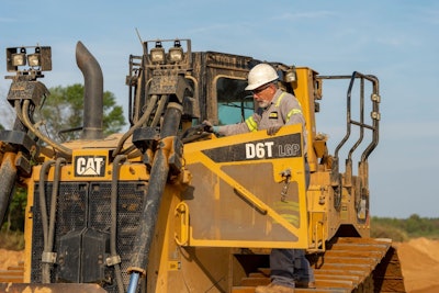 opeartor enters a caterpillar D6T