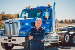 greg bagshaw in front of a truck
