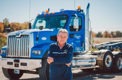 greg bagshaw in front of a truck