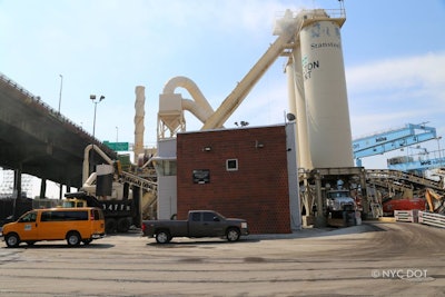 trucks outside an asphalt plant