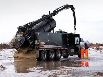 Operator empties a brandt hydrovac debris tank