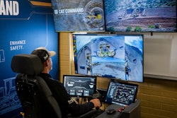 Operator uses Cat Command station to remotely operate a wheel loader