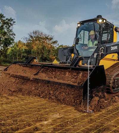 Deere compact track loader pushing dirt