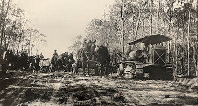 old black and white photo cat 60 tractor horses on roadbuilding project
