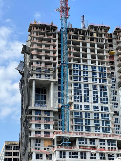 look at crane on side of fort lauderdale under-construction apartment building that collapsed