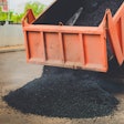 Dump Truck unloading asphalt