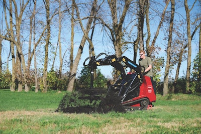Toro Dingo TX 1000 Turbo with auger spraying dirt