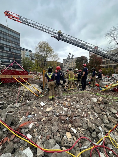 crane firefighter at site of man buried under rubble in Lousiville Ky