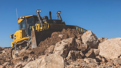 a john deere 1050 p tier dozer moves earth