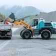 Liebherr L 566 H hydrogen wheel loader loads a truck at a quarry